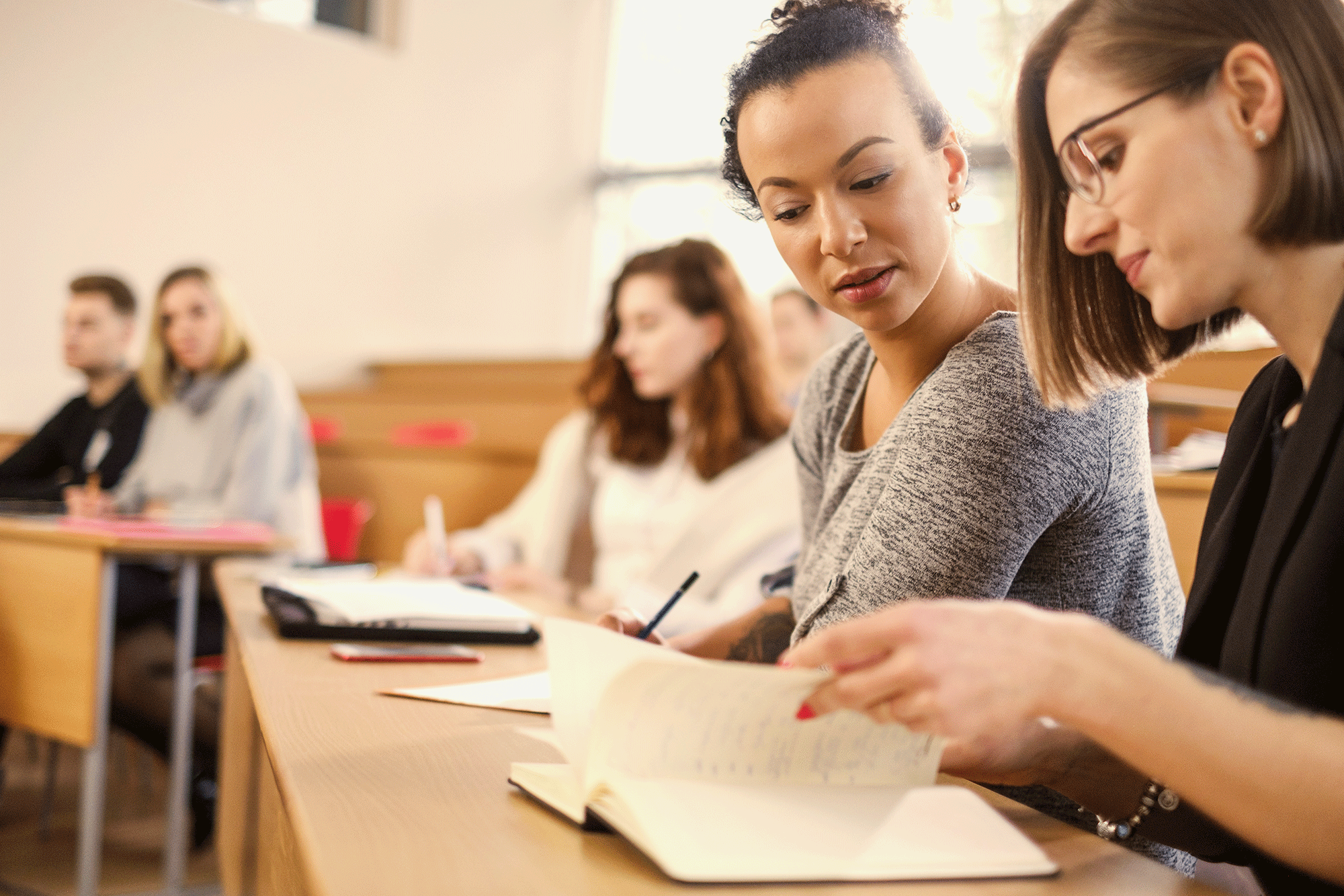 Students take a summer class at college.