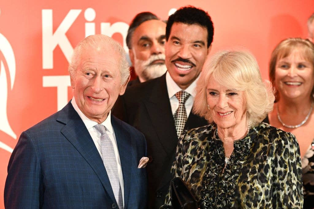 King Charles III, Lionel Richie and Queen Camilla smiling
