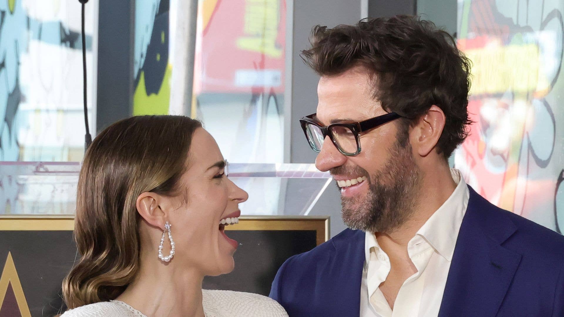 Emily Blunt and John Krasinski can't keep their hands off each other at star studded date night