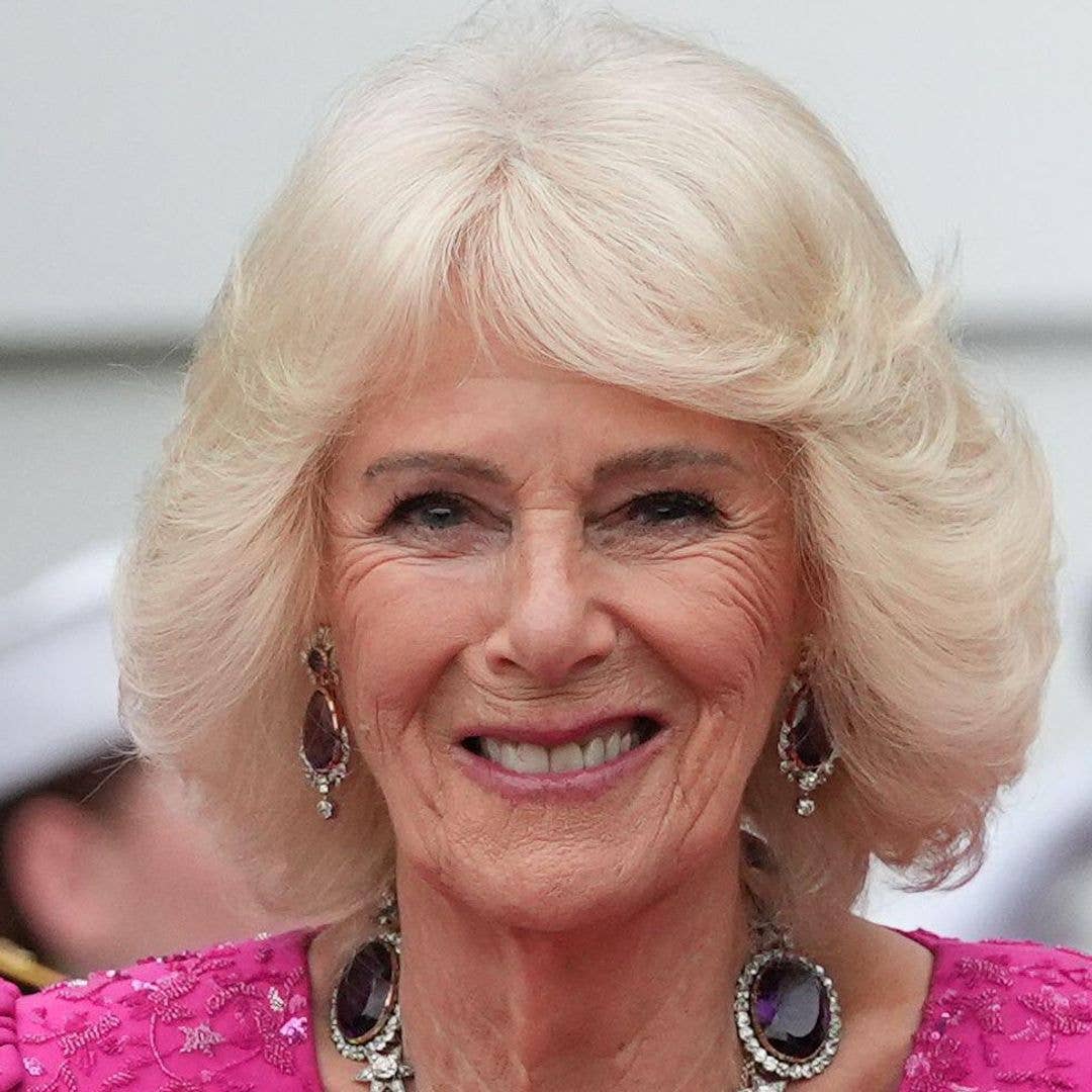 Queen Camilla stuns in Barbie pink banquet gown - but skips a tiara