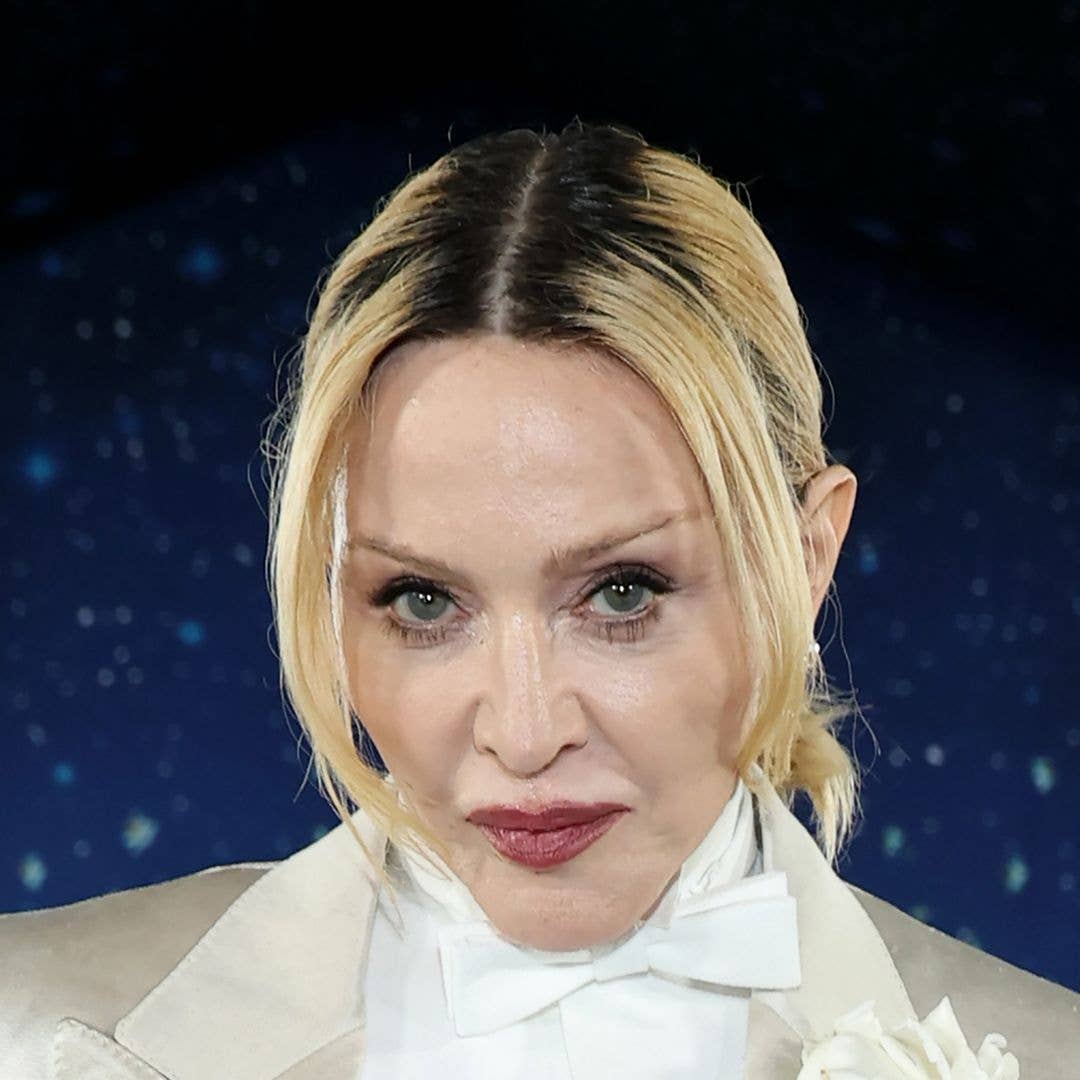 Madonna, 67, rocks sultry lingerie and a blindfold for rare Christmas photoshoot with boyfriend Akeem Morris, 29
