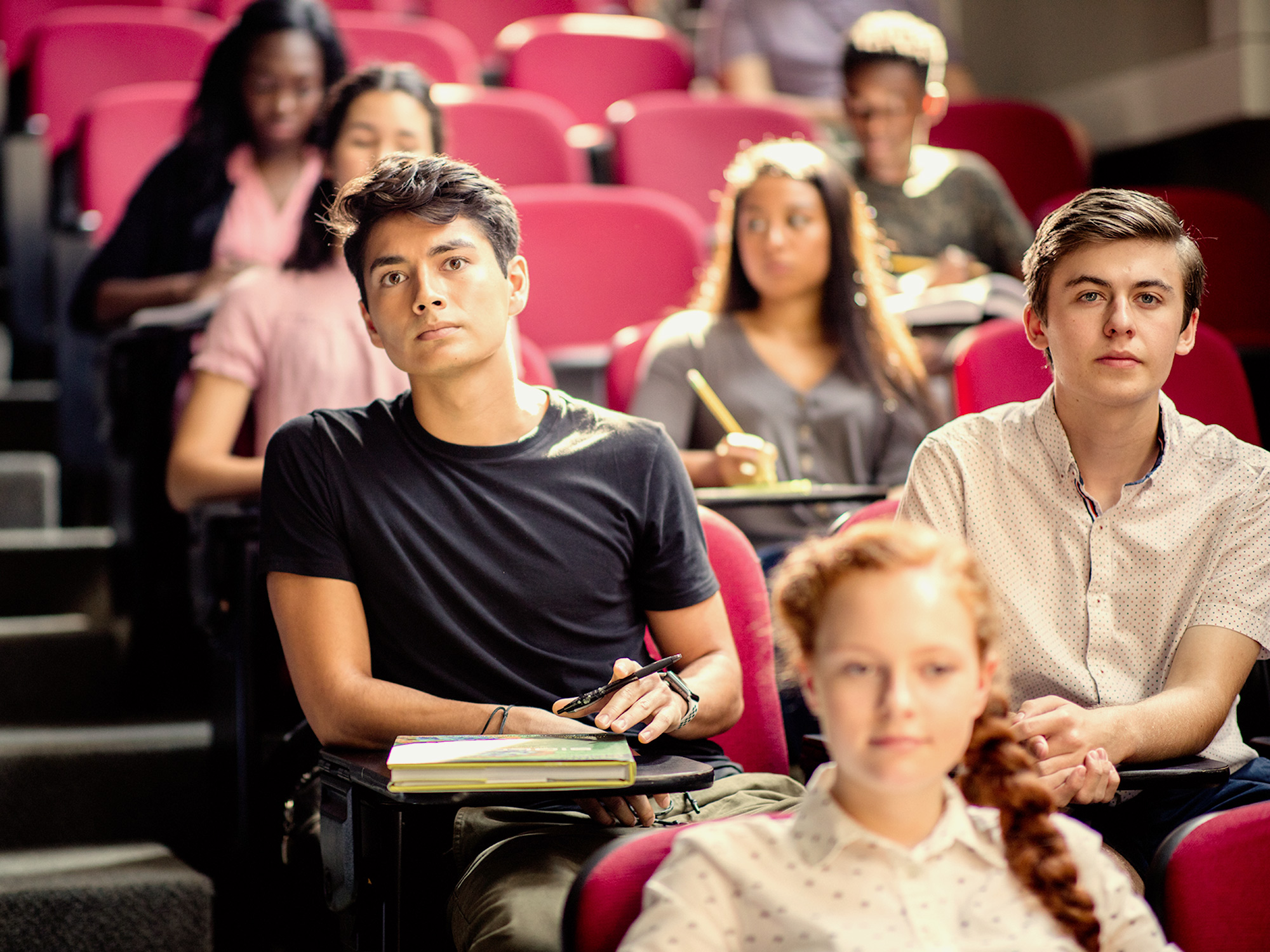 High school students attending a summer program lecture.